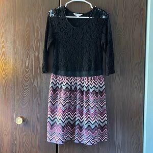 Speechless 3/4 sleeved black lace top and patterned bottom. Size XL.